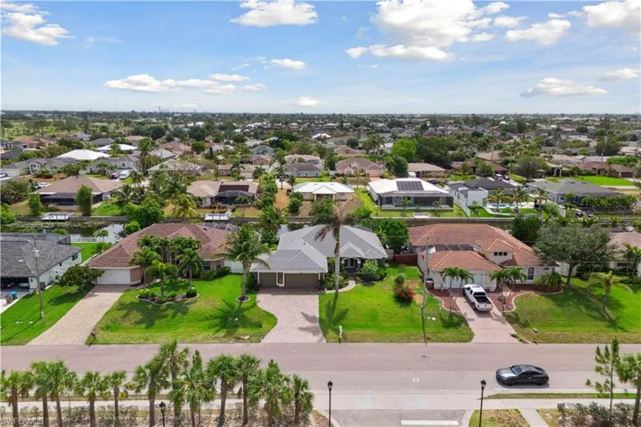 Aerial view of the homes nestled comfortably in their surroundings, creating a welcoming and harmonious neighborhood.
