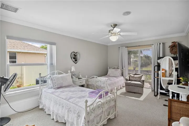 The second guest bedroom is a cozy and inviting space, designed for comfort and relaxation.