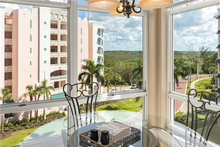 Breakfast nook with florr to ceiling windows