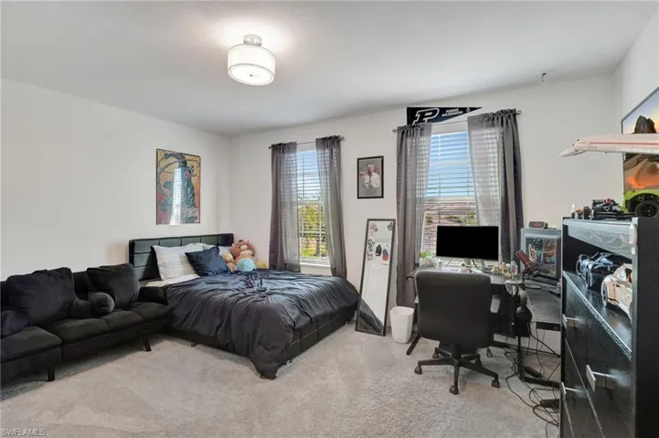 Bedroom with carpet