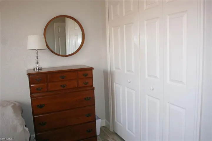 White paneled bi-fold closet doors