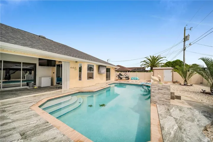 View of pool with a patio area