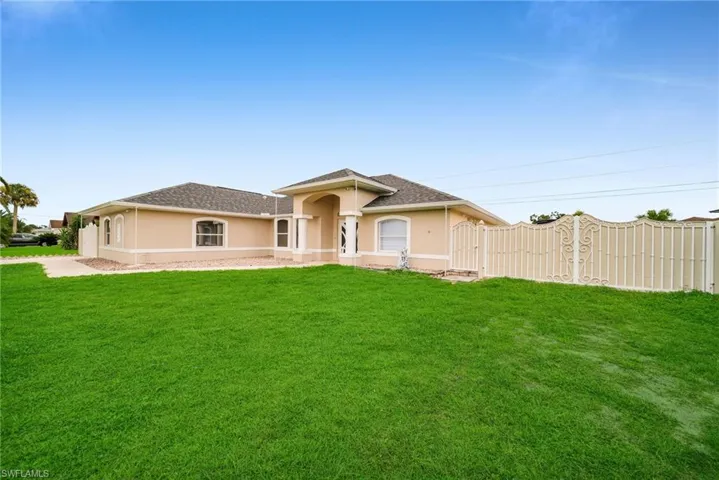 View of front of home with a front lawn