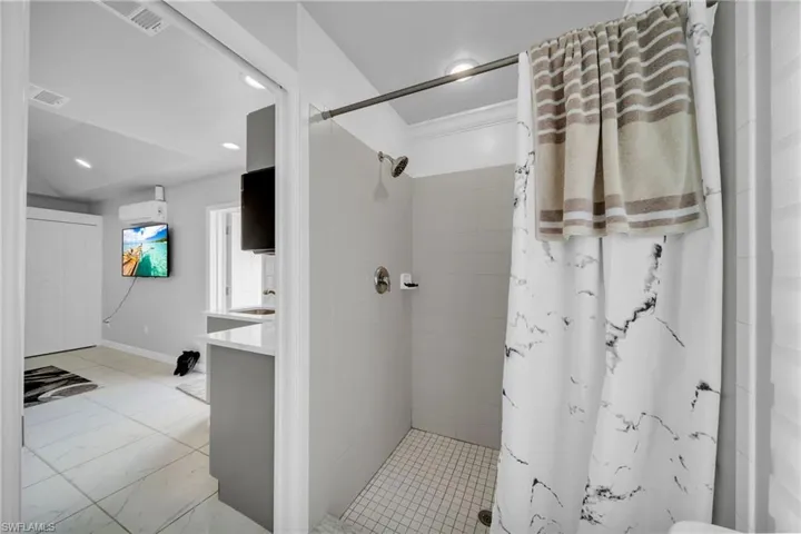 Bathroom with vanity and a shower with curtain