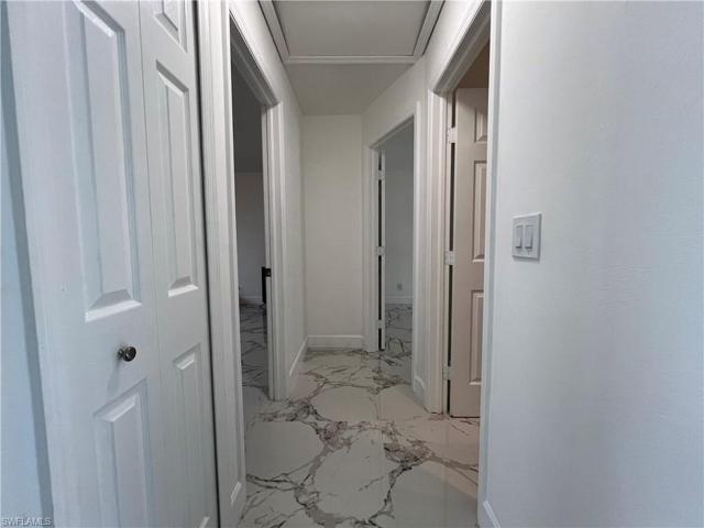 hallway to bedrooms 1 & 2 + guest bath