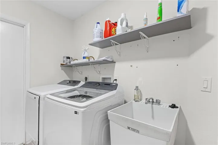 Laundry room featuring washing machine and dryer