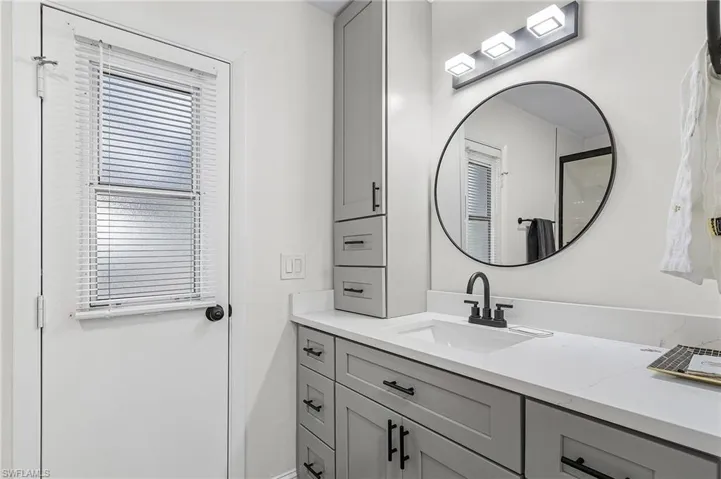 Full bathroom featuring vanity