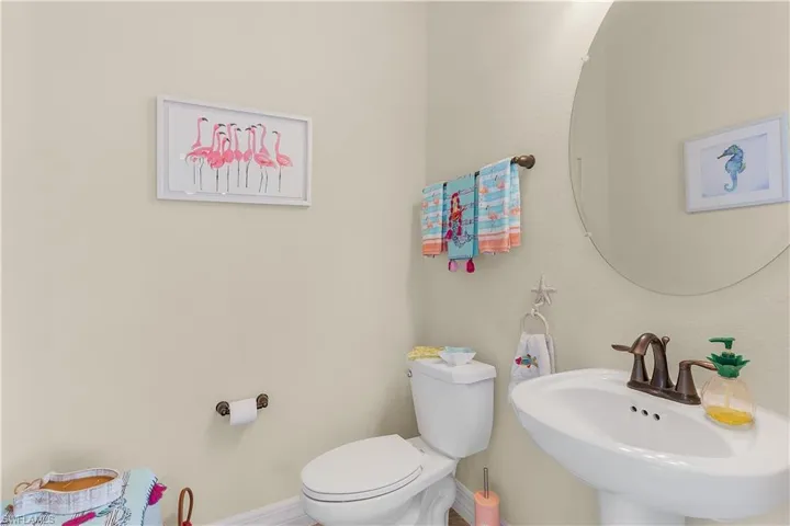 Bathroom featuring toilet and sink
