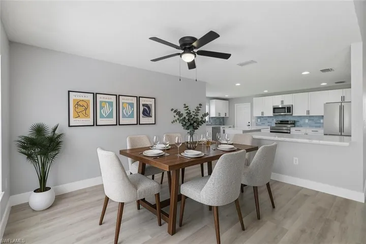 Light wood-finish flooring, recessed lighting, and a ceiling fan