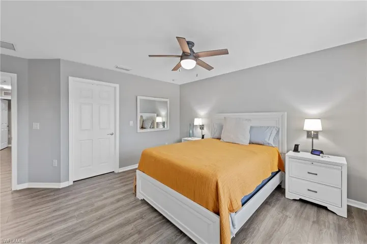 Bedroom featuring light wood finished floors and ceiling fan