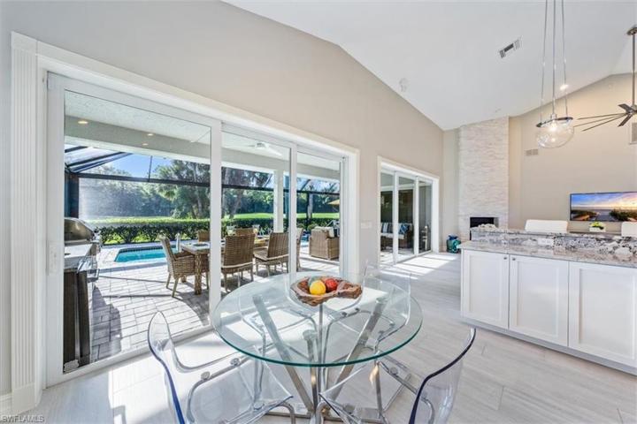 VERY LARGE LANAI WITH KITCHEN W/ GAS BBQ FACING GOLF COURSE, RESERVE AND LAKE