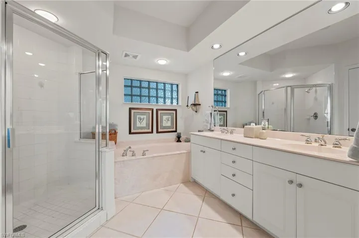 Dual sinks, soaking tub and walk-in shower