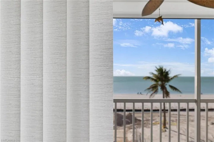New linen vertical blinds in the living room and both bedrooms.