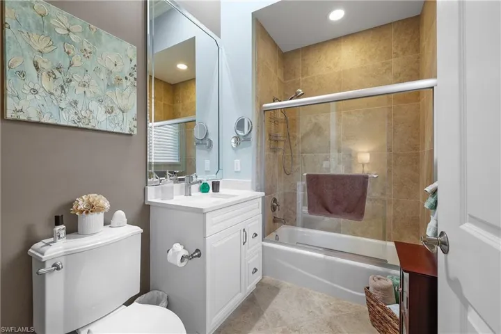 Full Ensuite Bathroom combined bath / shower with glass door
