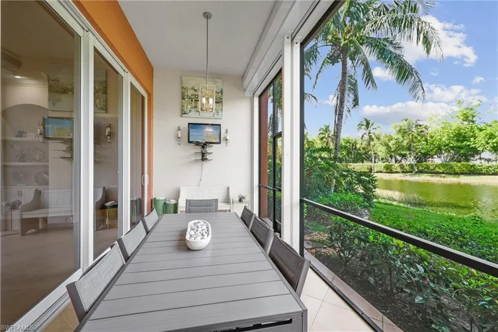 Screened lanai with electric roll down shutters