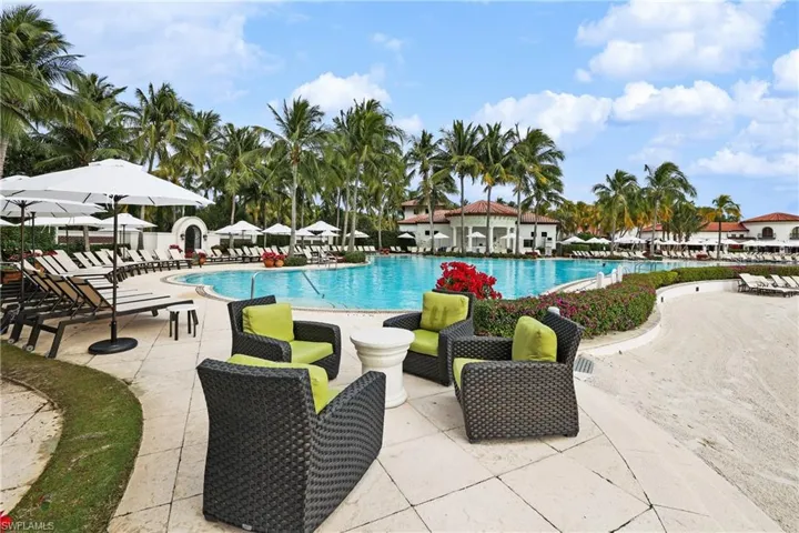 Pool with lounge chairs and sitting areas
