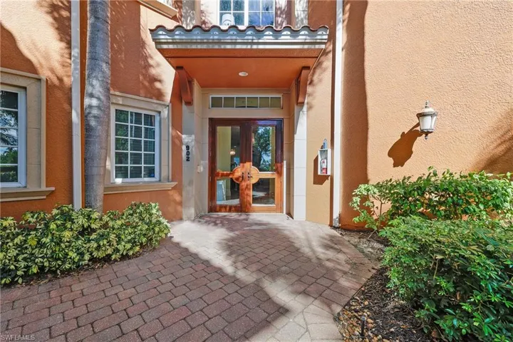 View of exterior entry featuring french doors