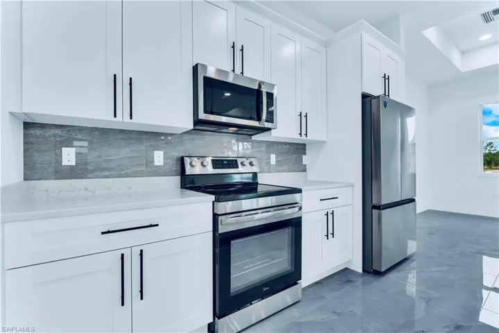 654 Trinity St E, Lehigh Acres, Florida 33974