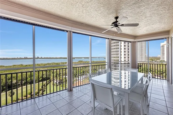 The lanai is easily accessible from both the living area and the primary bedroom, enhancing indoor-outdoor living.