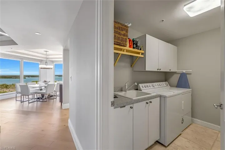 A dedicated laundry room complete with a sink, offering added convenience and functionality for everyday tasks.