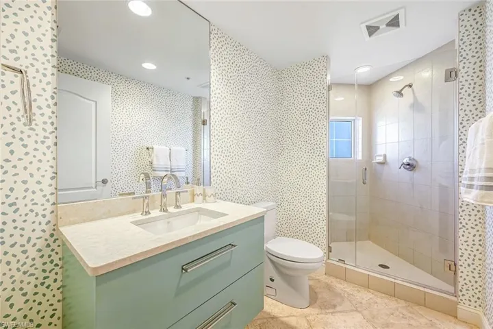 Second guest bathroom with custom finishes.