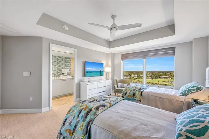 The guest bedroom enjoys tranquil eastern sky views.