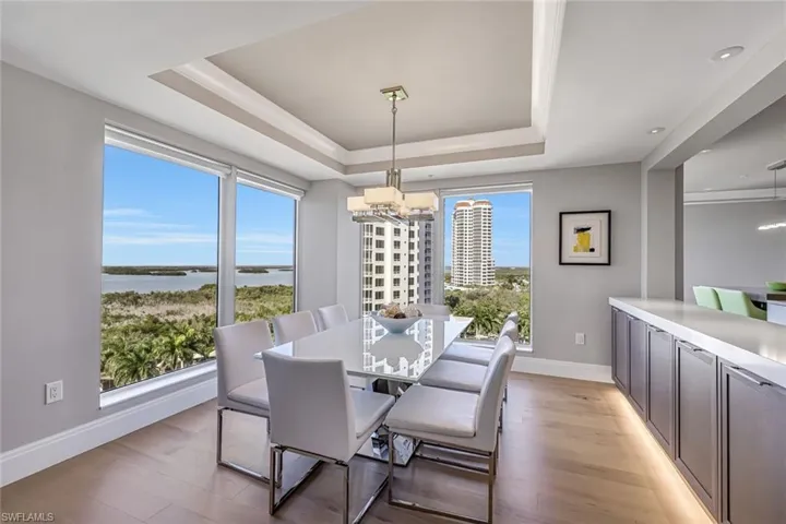 Spacious formal dining area, where the the Gulf view pairs beautifully with your favorite chef inspired meal.