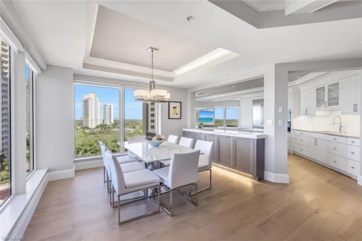 View of dining room and kitchen from living area.