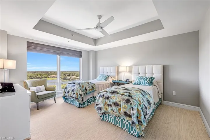 One of two spacious guest suites, thoughtfully separated from the main living area and primary bedroom.
