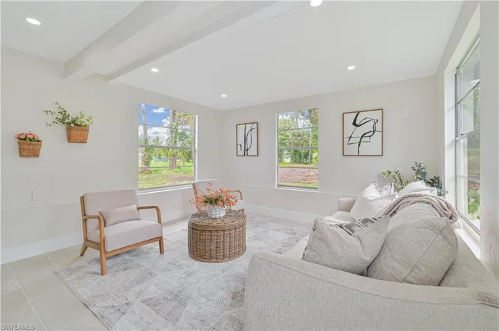 family room or can easily be a den/ office