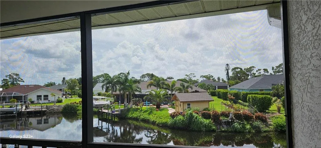 Water view featuring nearby suburban area