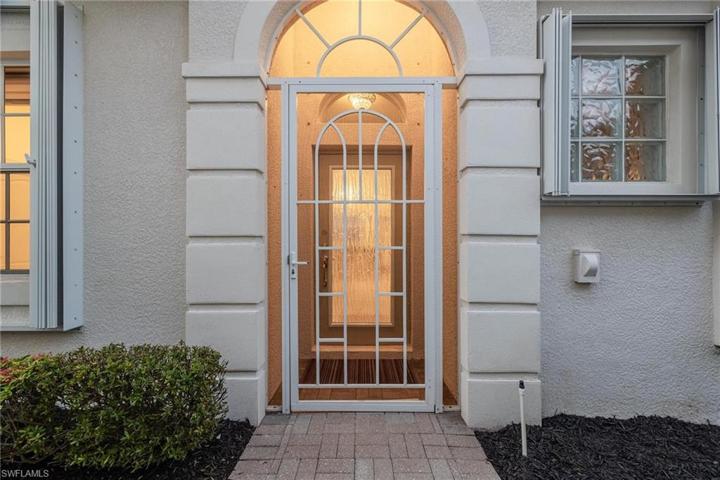 Main entrance on side of home - screened and protected.