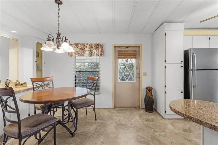 Dining area with a chandelier