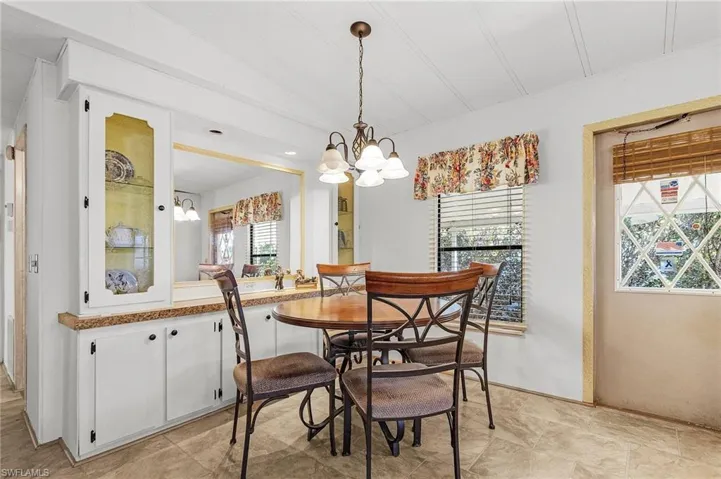 Dining area featuring a chandelier