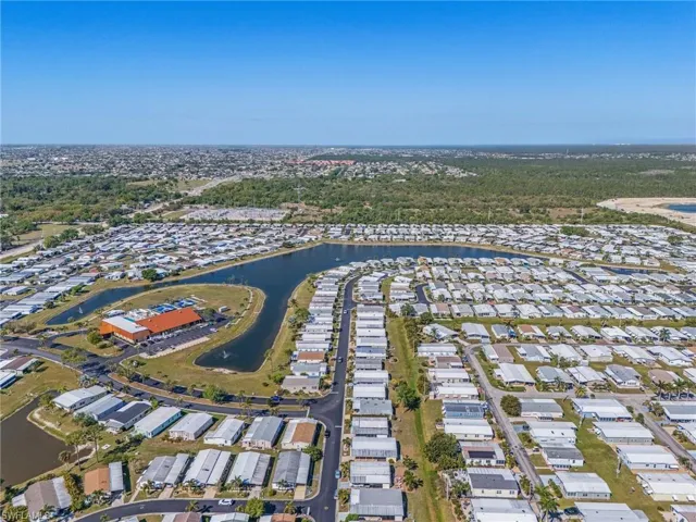Bird's eye view featuring a water view and a residential view