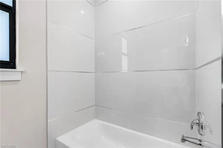 Bathroom with bathtub / shower combination
