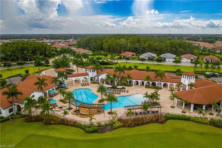 Resort style pool with waterfall - restaurant - fitness - tennis - pickleball - bocci - theater - coffee room - yoga studio