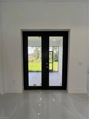 Entryway featuring french doors