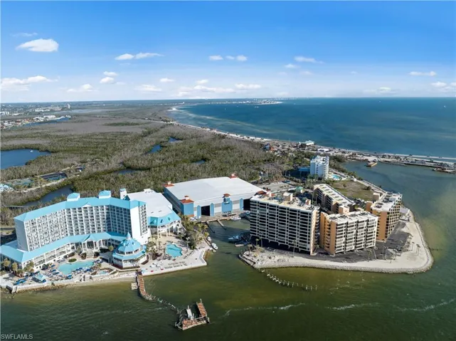 Bird's eye view of a large body of water and apartment complex