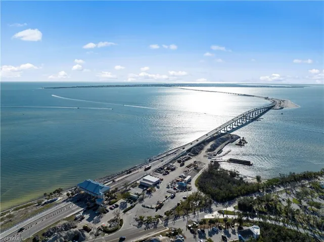 Bird's eye view of a notable bridge and a nearby body of water
