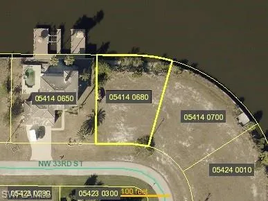 Aerial map of property and surrounding area featuring property parcel outlined