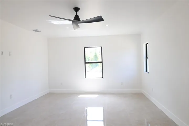 Bedroom featuring ceiling fan and recessed lighting