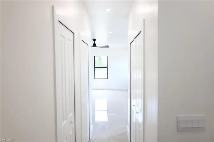 Washroom featuring washer and dryer and cabinet space
