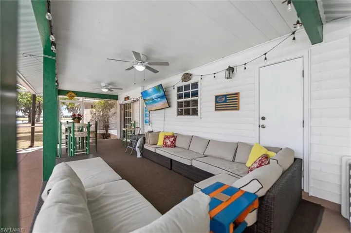 View of patio / terrace with ceiling fan and outdoor lounge area