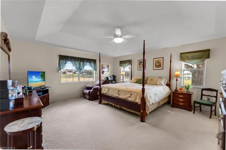 Bedroom with carpet floors and ceiling fan