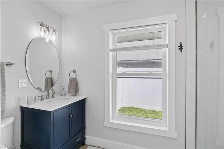 Bathroom with vanity and toilet