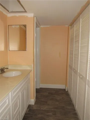 Bathroom featuring vanity and hardwood / wood-style flooring