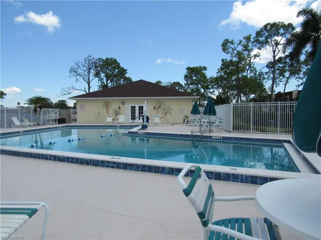 View of swimming pool with a patio area