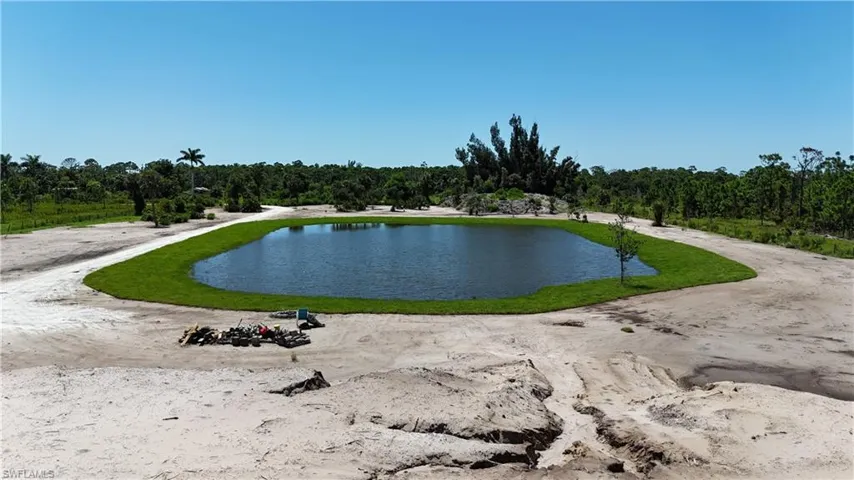 View of property's community with a water view