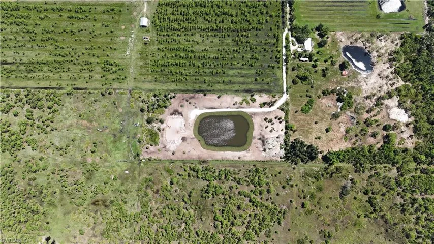 View of property location featuring rural landscape and large plots for crops